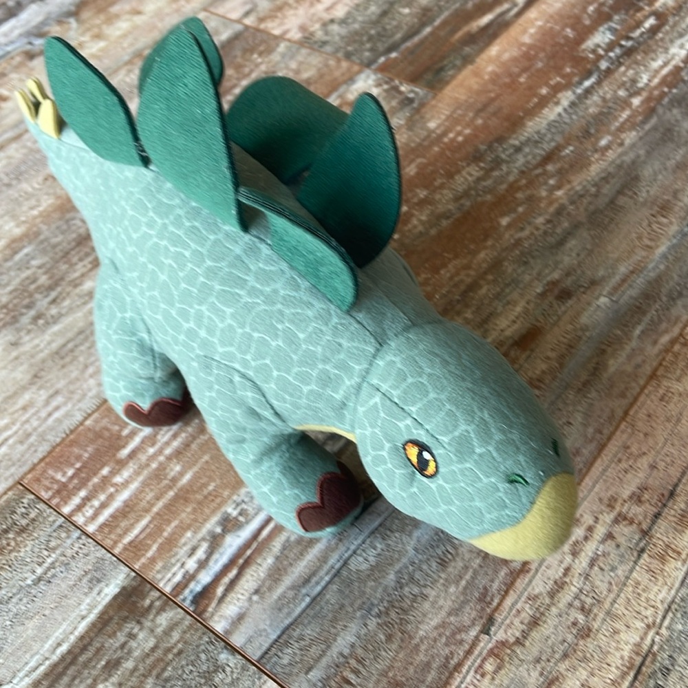 Stegosaurus stuffed animal. with patch stitched eyes. 11 inches long
